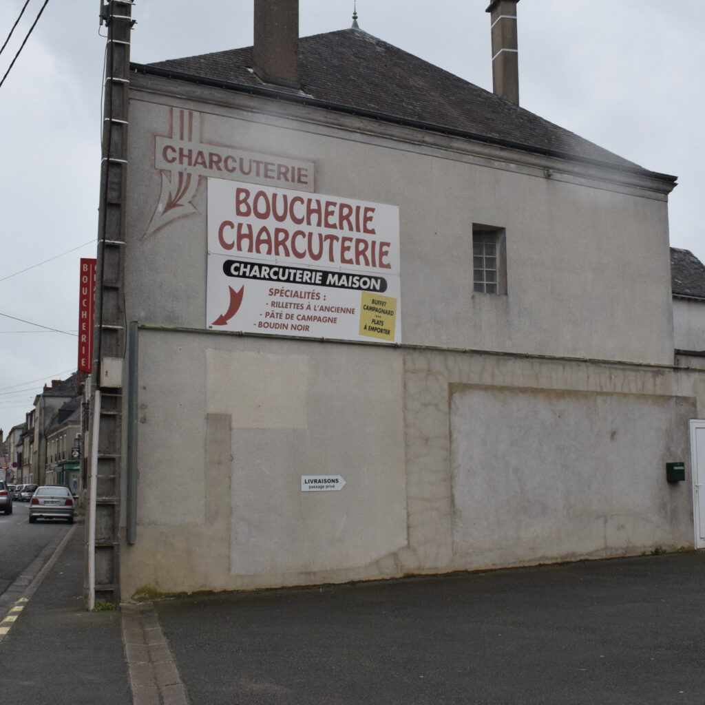 Avant réalisation du trompe l'oeil sur boucherie.