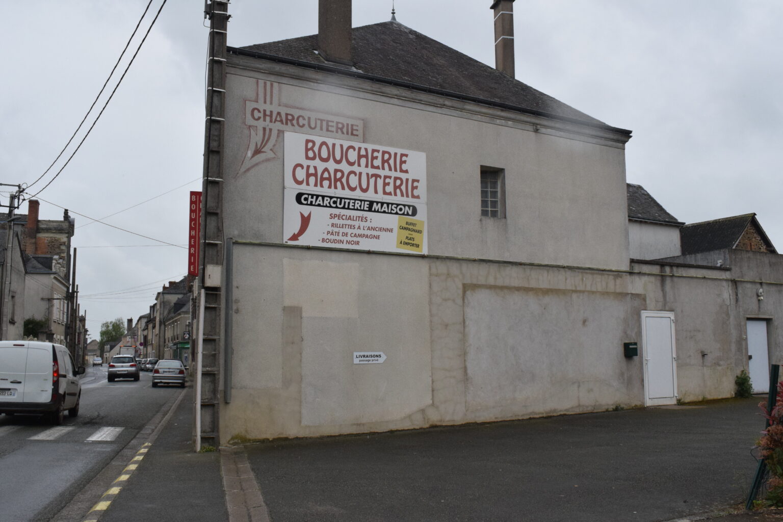 Avant réalisation du trompe l'oeil sur boucherie.